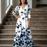 Celeste™ | Vestido midi floral com decote cruzado e manga a três quartos
