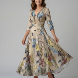 Celeste™ | Vestido midi floral com decote cruzado e manga a três quartos