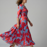 Celeste™ | Vestido midi floral com decote cruzado e manga a três quartos
