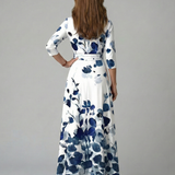 Celeste™ | Vestido midi floral com decote cruzado e manga a três quartos