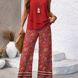 Candelária™ | Conjunto boho com top em camadas e calças florais